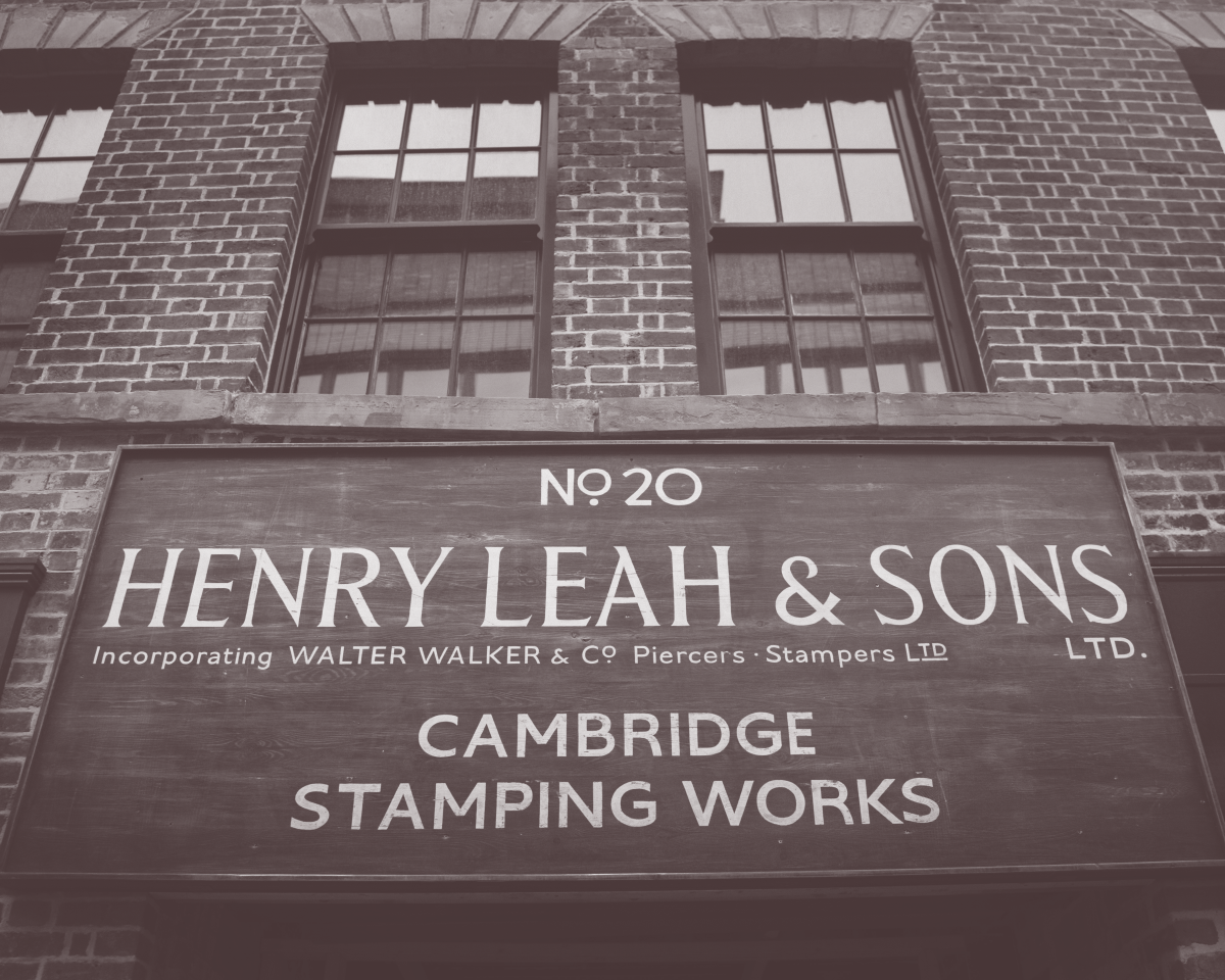 Sepia toned image of the Leah's Yard signage, reading Number 20 Henry Leah & Sons Cambridge Stamping Works